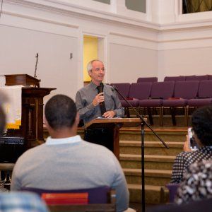 A man speaking about fighting racism at a church-hosted event in New Orleans.