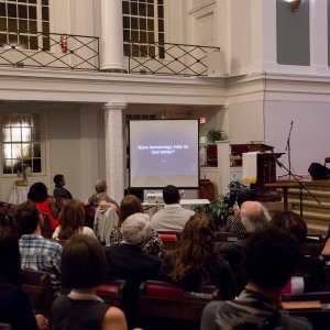 People learning about coming together across racial lines at a church-hosted event.